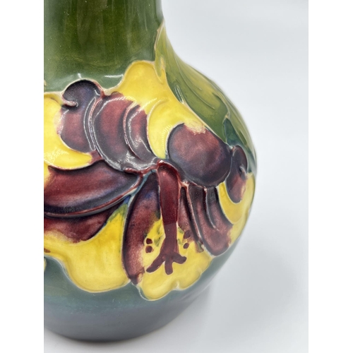 14 - A Moorcroft Pottery Hibiscus pattern vase - approx. 13cm high