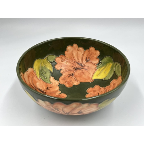 15 - A Moorcroft Pottery Coral Hibiscus pattern circular footed bowl, signed to base - approx. 7.5cm high... 