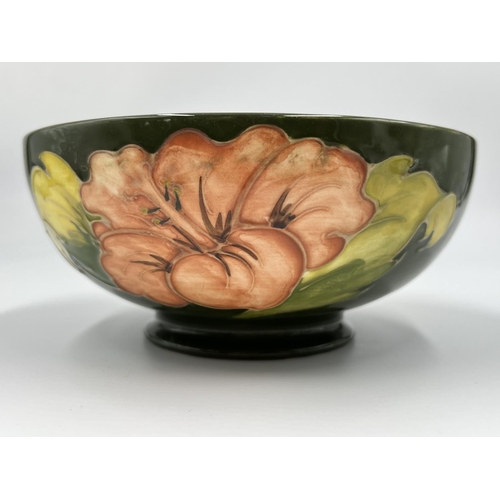 15 - A Moorcroft Pottery Coral Hibiscus pattern circular footed bowl, signed to base - approx. 7.5cm high... 