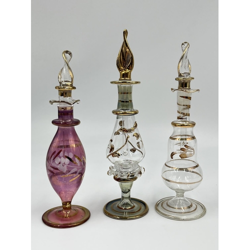 24 - Five pieces of studio glass, three scent bottles and two figurines