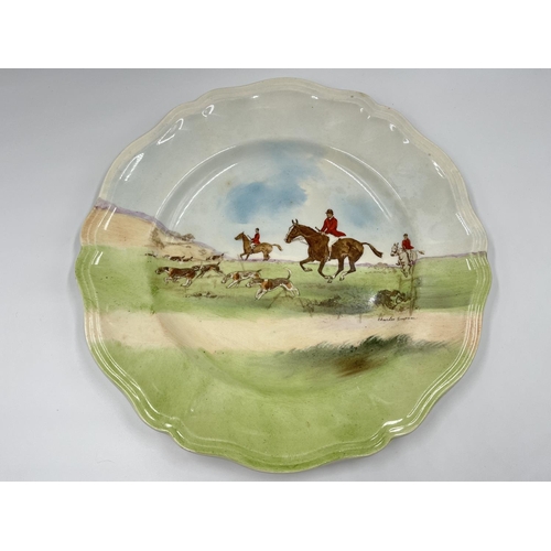 29 - A Royal Doulton Across The Moor D6326 plate signed Charles Simpson - approx. 27cm diameter