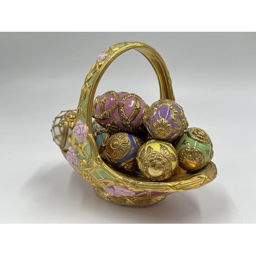 4 - A Franklin Mint porcelain Summer egg basket with nine eggs - approx. 11cm high x 9cm wide x 13cm lon... 