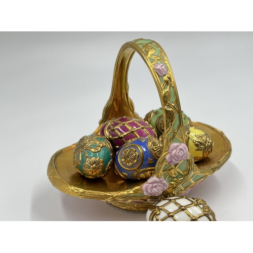 4 - A Franklin Mint porcelain Summer egg basket with nine eggs - approx. 11cm high x 9cm wide x 13cm lon... 