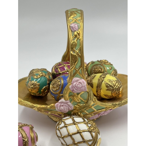 4 - A Franklin Mint porcelain Summer egg basket with nine eggs - approx. 11cm high x 9cm wide x 13cm lon... 