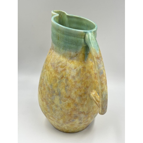 41 - A 1930s Beswick Ware yellow and green mottled jug, shape no. 119 - approx. 27cm high