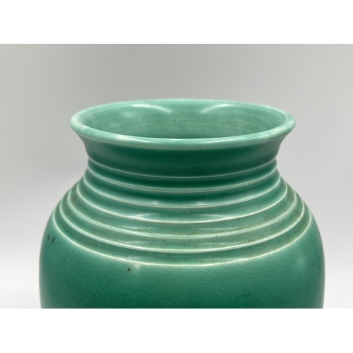 42 - An Art Deco Bretby green glazed vase with impressed number 3489 to base - approx. 20.5cm high