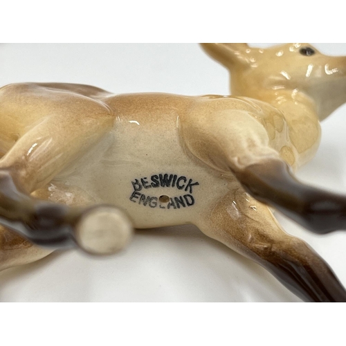 44 - Five Beswick animal figurines to include donkey, Solomon of Wendover golden labrador, deer etc.