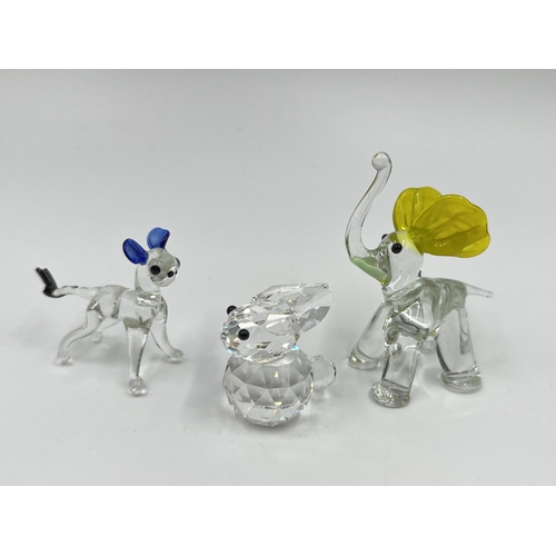 49 - Fourteen studio glass animal figurines to include penguin, frog, elephant etc.