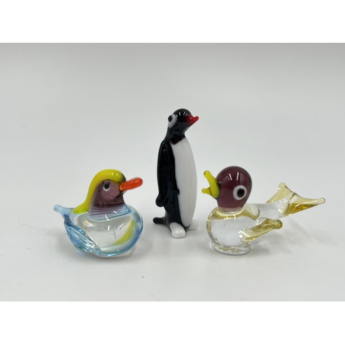 50 - Twelve studio glass animal figurines to include dog, cat, penguin etc.