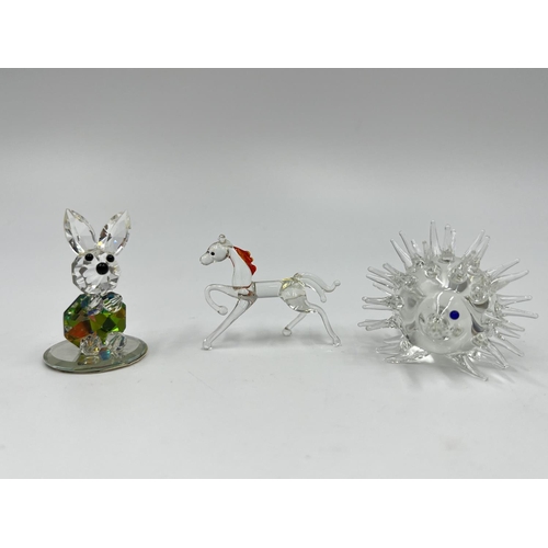 50 - Twelve studio glass animal figurines to include dog, cat, penguin etc.