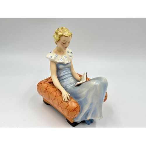 58 - A pair of Art Deco Goebel hand painted ceramic lady reading book bookends with impressed trademark o... 