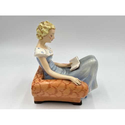 58 - A pair of Art Deco Goebel hand painted ceramic lady reading book bookends with impressed trademark o... 