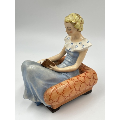 58 - A pair of Art Deco Goebel hand painted ceramic lady reading book bookends with impressed trademark o... 