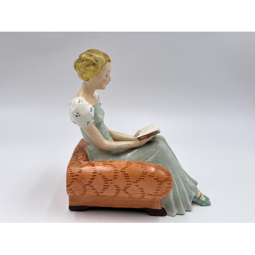 58 - A pair of Art Deco Goebel hand painted ceramic lady reading book bookends with impressed trademark o... 