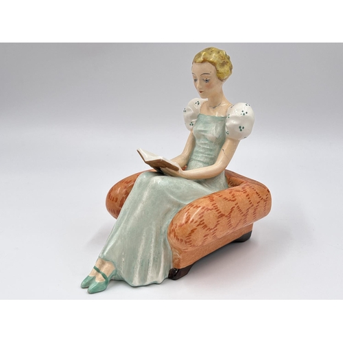 58 - A pair of Art Deco Goebel hand painted ceramic lady reading book bookends with impressed trademark o... 