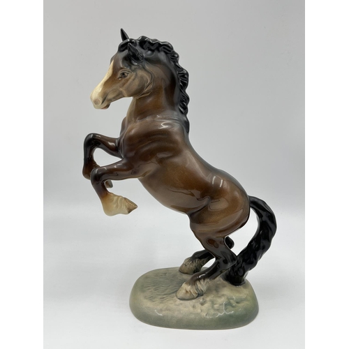 59 - A Beswick Ware Rearing Cob Horse figurine, model no. 1014 - approx. 26cm high