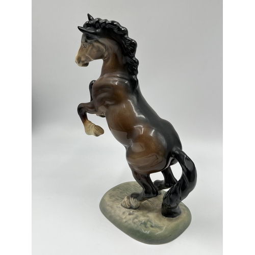 59 - A Beswick Ware Rearing Cob Horse figurine, model no. 1014 - approx. 26cm high