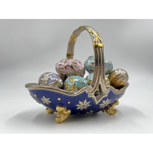 6 - A Franklin Mint porcelain Winter egg basket with nine eggs - approx. 10.5cm high x 9cm wide x 13cm l... 