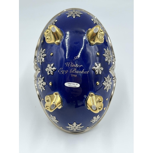 6 - A Franklin Mint porcelain Winter egg basket with nine eggs - approx. 10.5cm high x 9cm wide x 13cm l... 