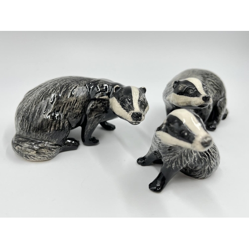 60 - A Beswick badger family comprising model no. 3392 cub, model no. 3393 male and model no.3394 female