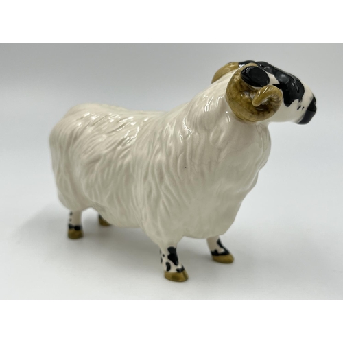 69 - Two Beswick animal figurines, one Ch. Wall Queen 40 pig and one ram