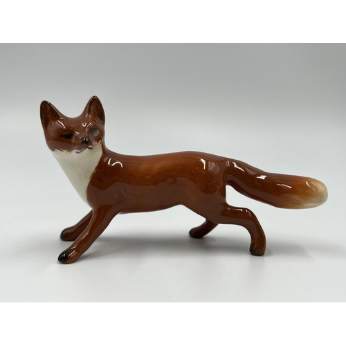 70 - Four boxed Beswick fox figurines