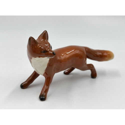 70 - Four boxed Beswick fox figurines