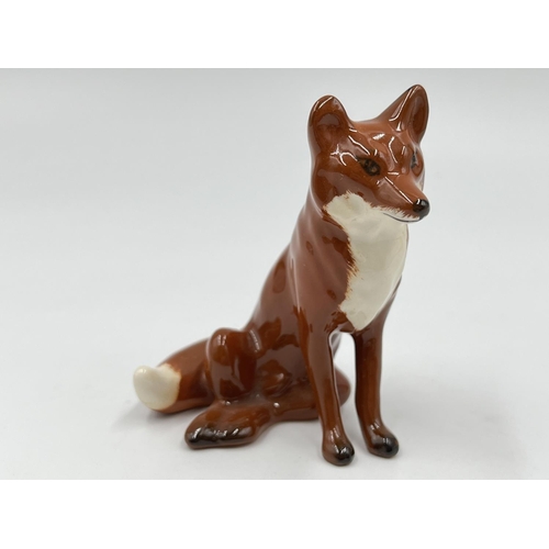 70 - Four boxed Beswick fox figurines