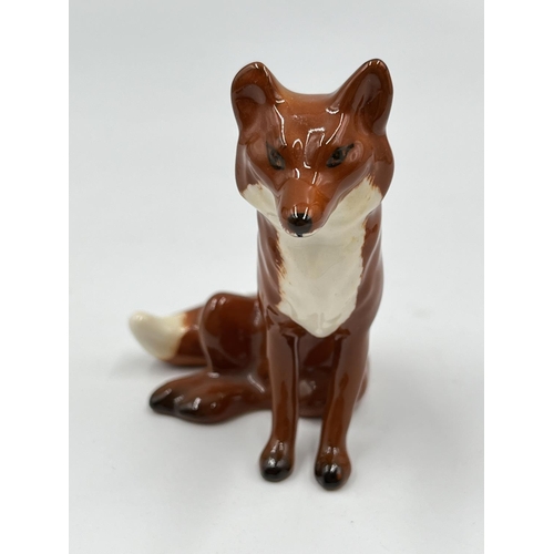 70 - Four boxed Beswick fox figurines