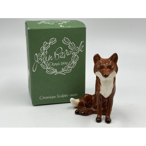 70 - Four boxed Beswick fox figurines