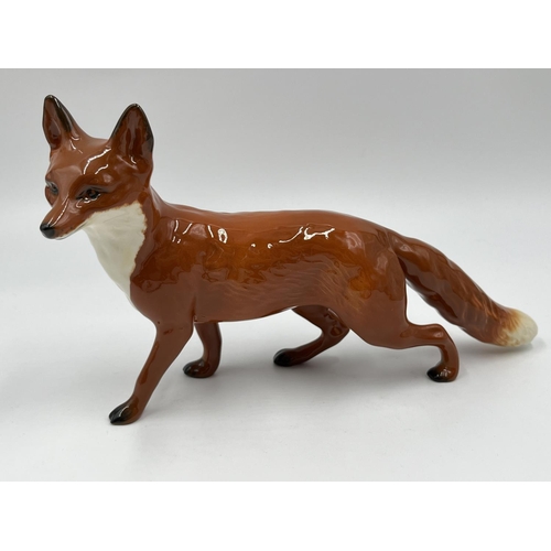 70 - Four boxed Beswick fox figurines