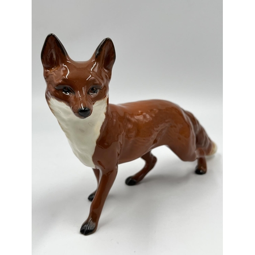 70 - Four boxed Beswick fox figurines