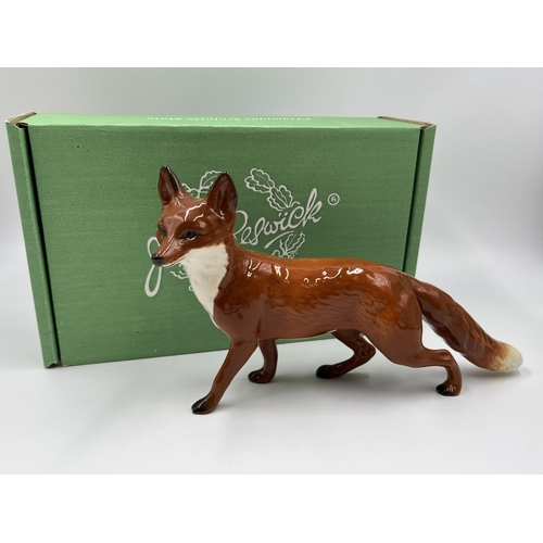 70 - Four boxed Beswick fox figurines