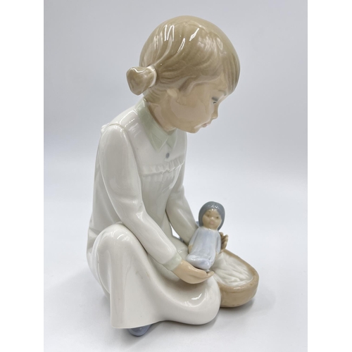 72 - Two Spanish 16cm porcelain figurines, one Nao by Lladro and one Zaphir