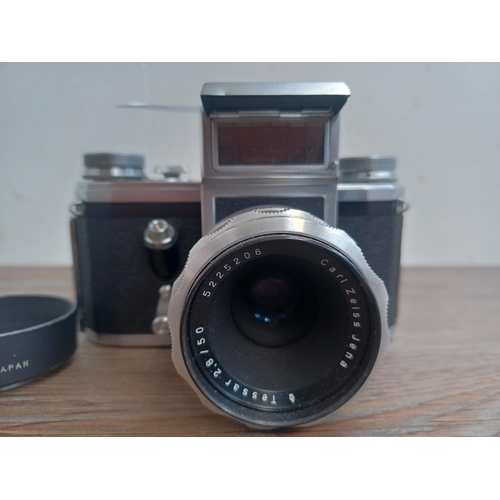 509 - A late 1950s Contax FB 35mm SLR camera fitted with Zeiss Tessar 2.8/50 lens