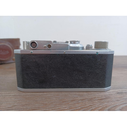 513 - A cased late 1940s Canon S-II 35mm combined rangefinder/viewfinder camera (serial no. 21279) fitted ... 