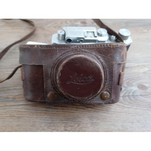 513 - A cased late 1940s Canon S-II 35mm combined rangefinder/viewfinder camera (serial no. 21279) fitted ... 