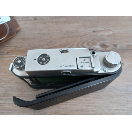 514 - A cased late 1950s Japanese Owla Stereo 35mm stereo camera fitted with Owla anastigmat f=35mm 1:3.5 ... 