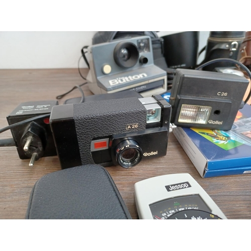 516 - A collection of cameras, camera equipment and accessories to include Rollei A 26 compact camera for ... 