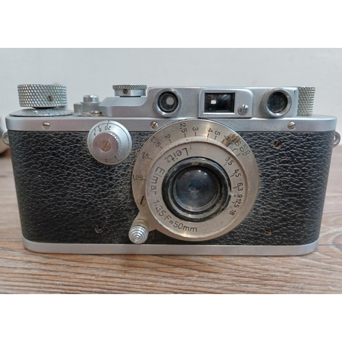 518 - Two items, one cased 1939 Ernst Leitz Leica IIIa 35mm rangefinder camera (serial no.314937) fitted w... 