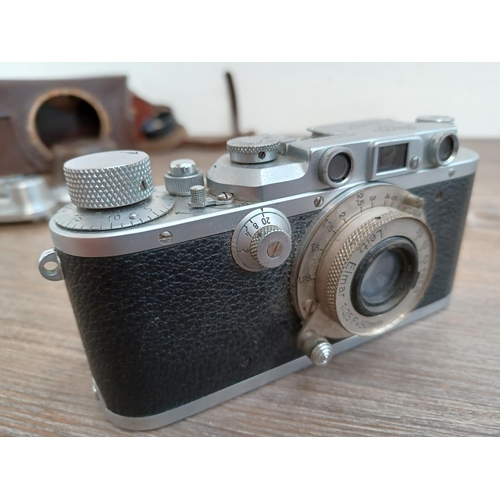 518 - Two items, one cased 1939 Ernst Leitz Leica IIIa 35mm rangefinder camera (serial no.314937) fitted w... 