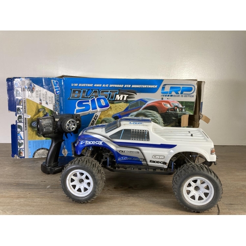 131 - Two boxed radio control model vehicles, one LRP Blast MT S10 1/10 electric 4WD off road monster truc... 