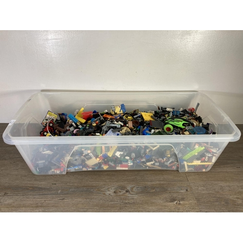 132 - A large collection of assorted Lego and toys to include Star Wars figurines etc.