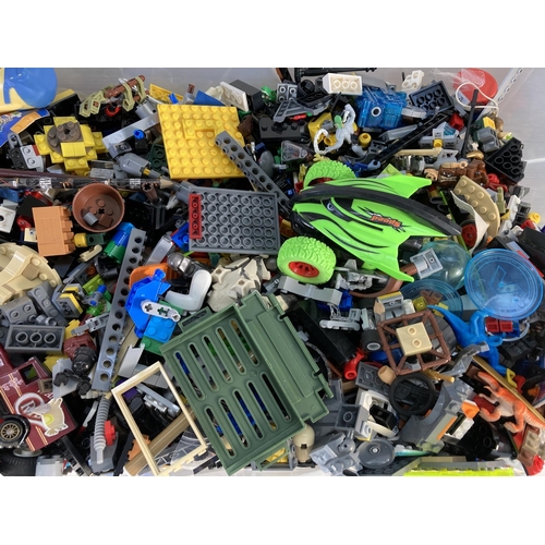 132 - A large collection of assorted Lego and toys to include Star Wars figurines etc.