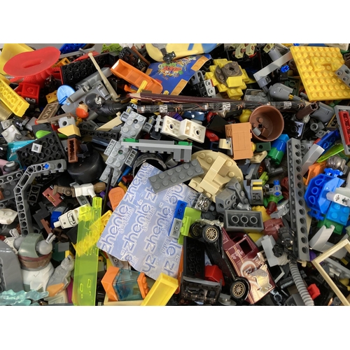 132 - A large collection of assorted Lego and toys to include Star Wars figurines etc.