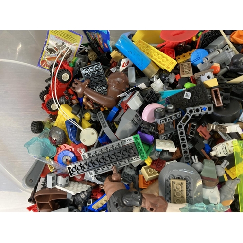 132 - A large collection of assorted Lego and toys to include Star Wars figurines etc.