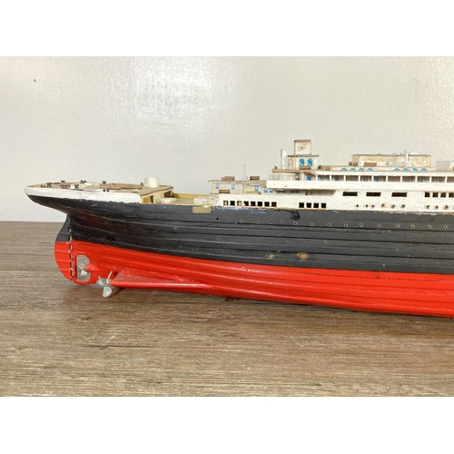 134 - A hand painted scratch built Titanic model ship - 14cm high x 12cm wide x 108cm long