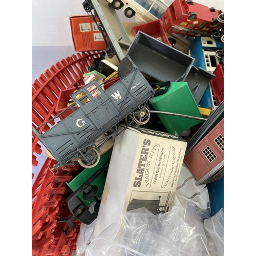 136 - A collection of assorted model railway accessories and diecast vehicles to include Dinky Vega Major ... 