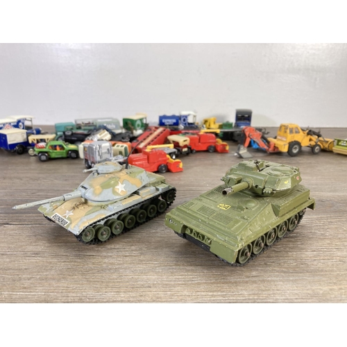 143 - A collection of assorted diecast model vehicles to include Matchbox 1912 Ford Model T, Dinky Alvis S... 