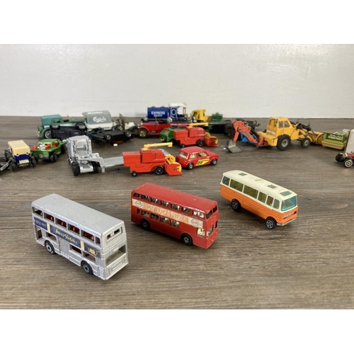 143 - A collection of assorted diecast model vehicles to include Matchbox 1912 Ford Model T, Dinky Alvis S... 